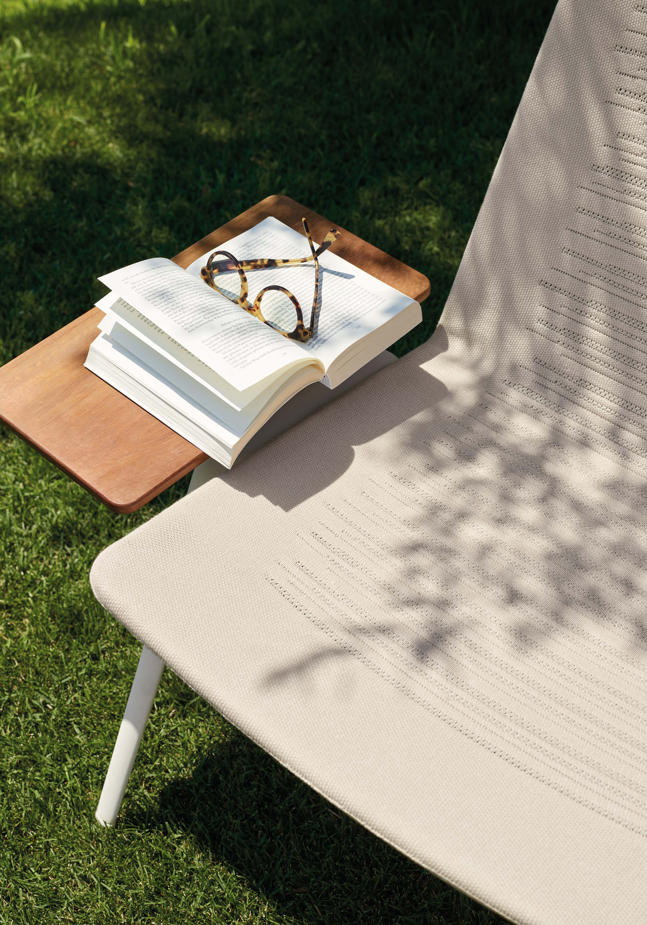 Zebra Knit highback lounge chair with side table by Fast STYLEPARK