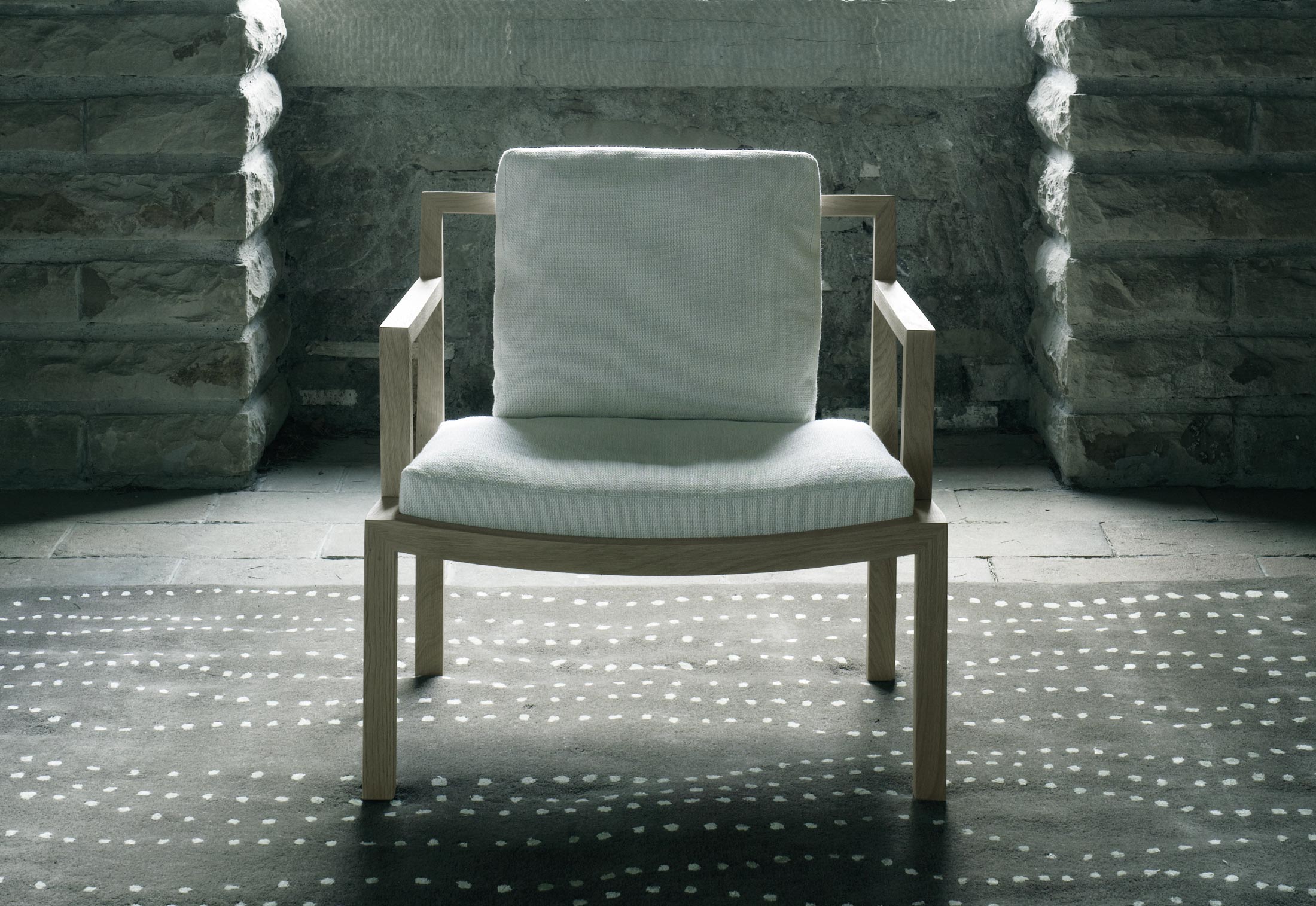Gray lounge chair by Living Divani STYLEPARK
