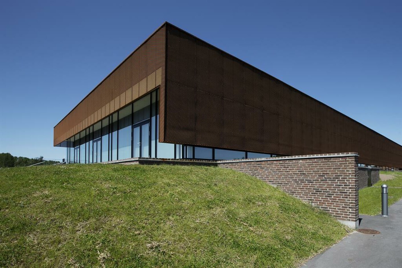 Perforated sun screens in Corten, Sports hall in Ringsted Campus by