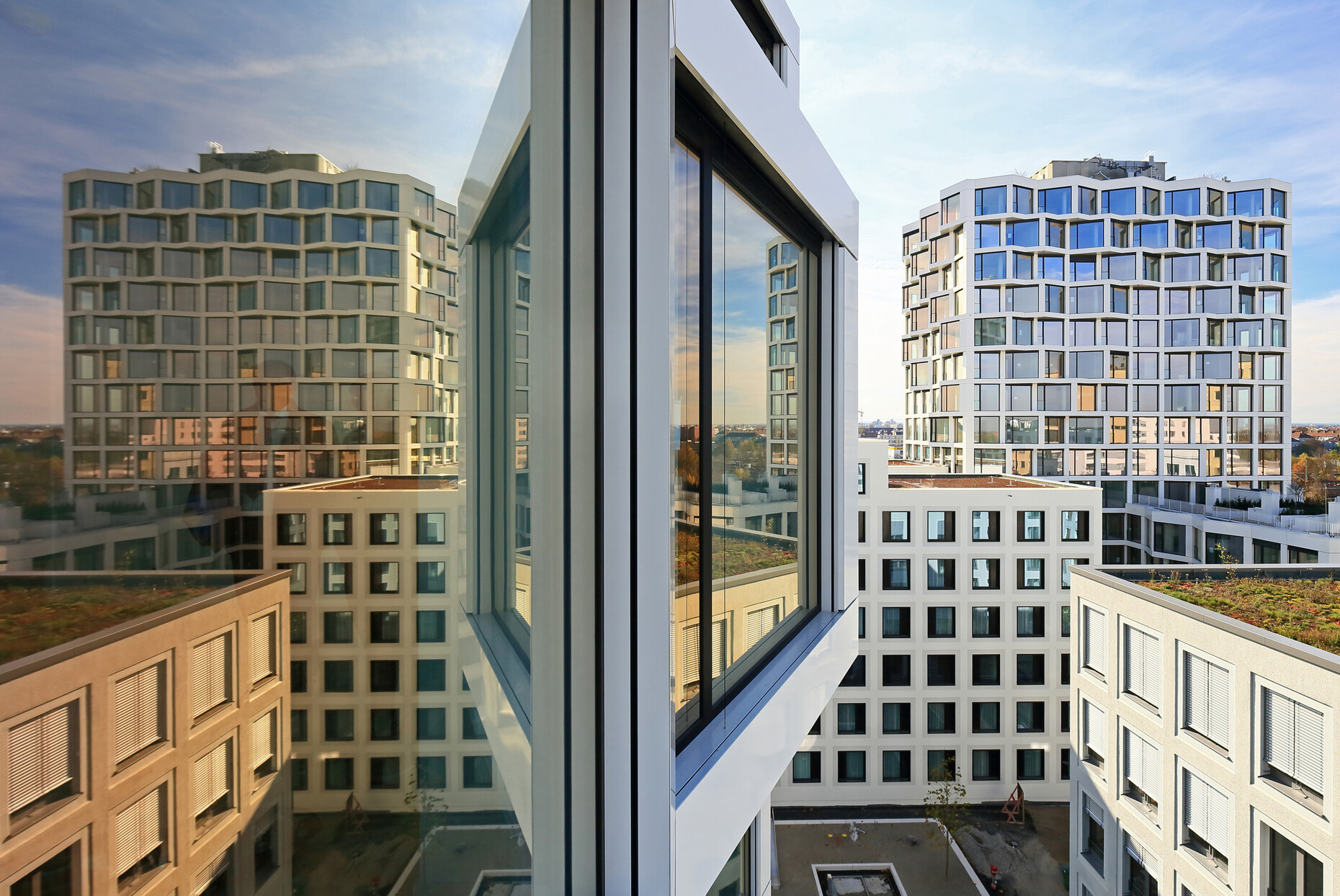 The residential buildings offer interesting views from every perspective with a striking cubature and bodied depth panorama windows.