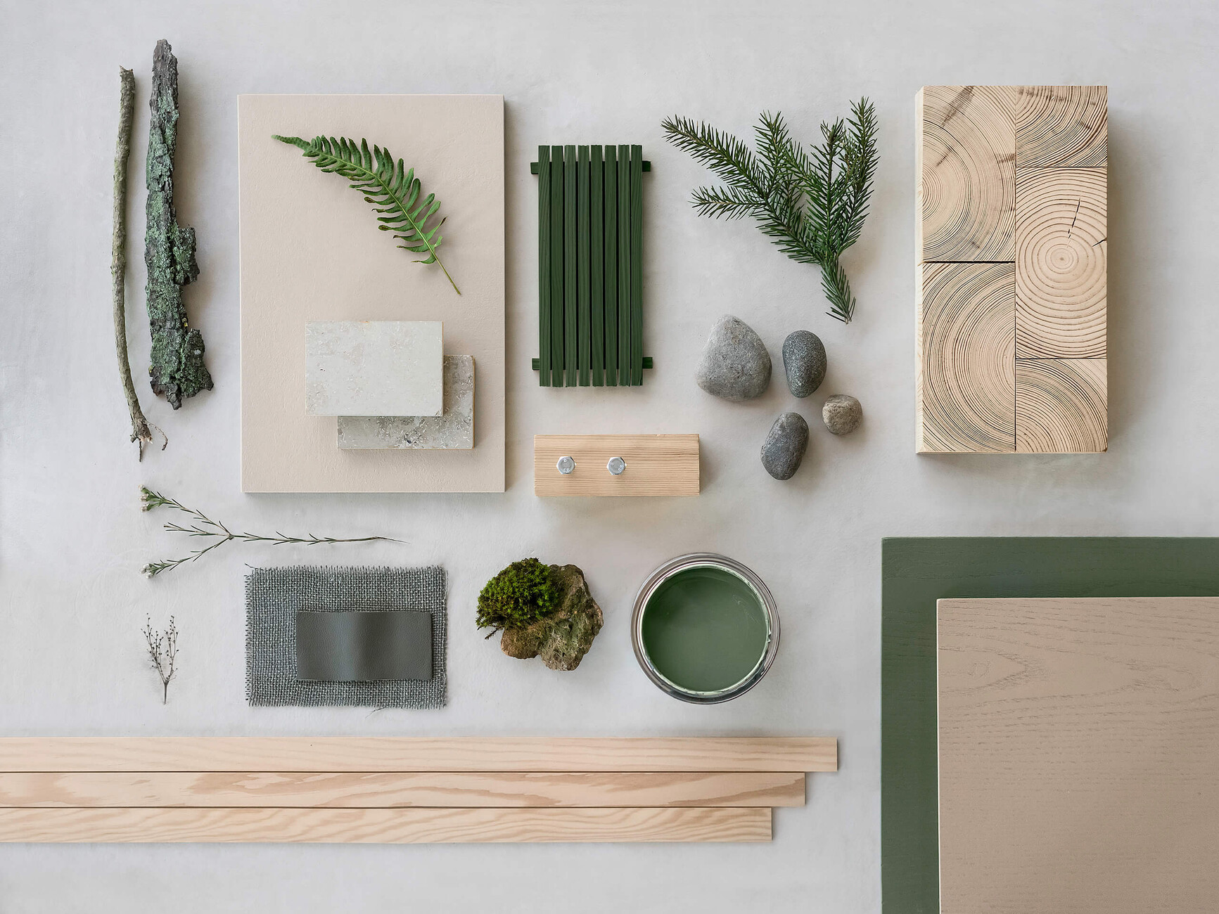 For the Moldboard Note Design Studio combined bright wood with details in anthrazit and pine green.