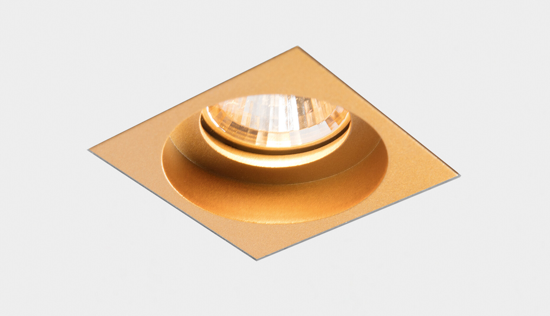 No screws needed: the small square receccessed spotlight "Qbini trimless".