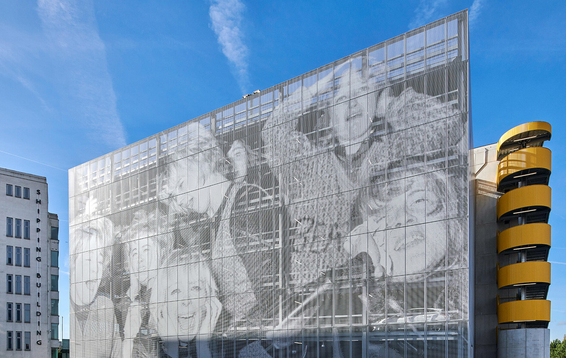 The façade of the multi-story carpark has been clad in 3,500 square meters of perforated metal courtesy of RMIG.