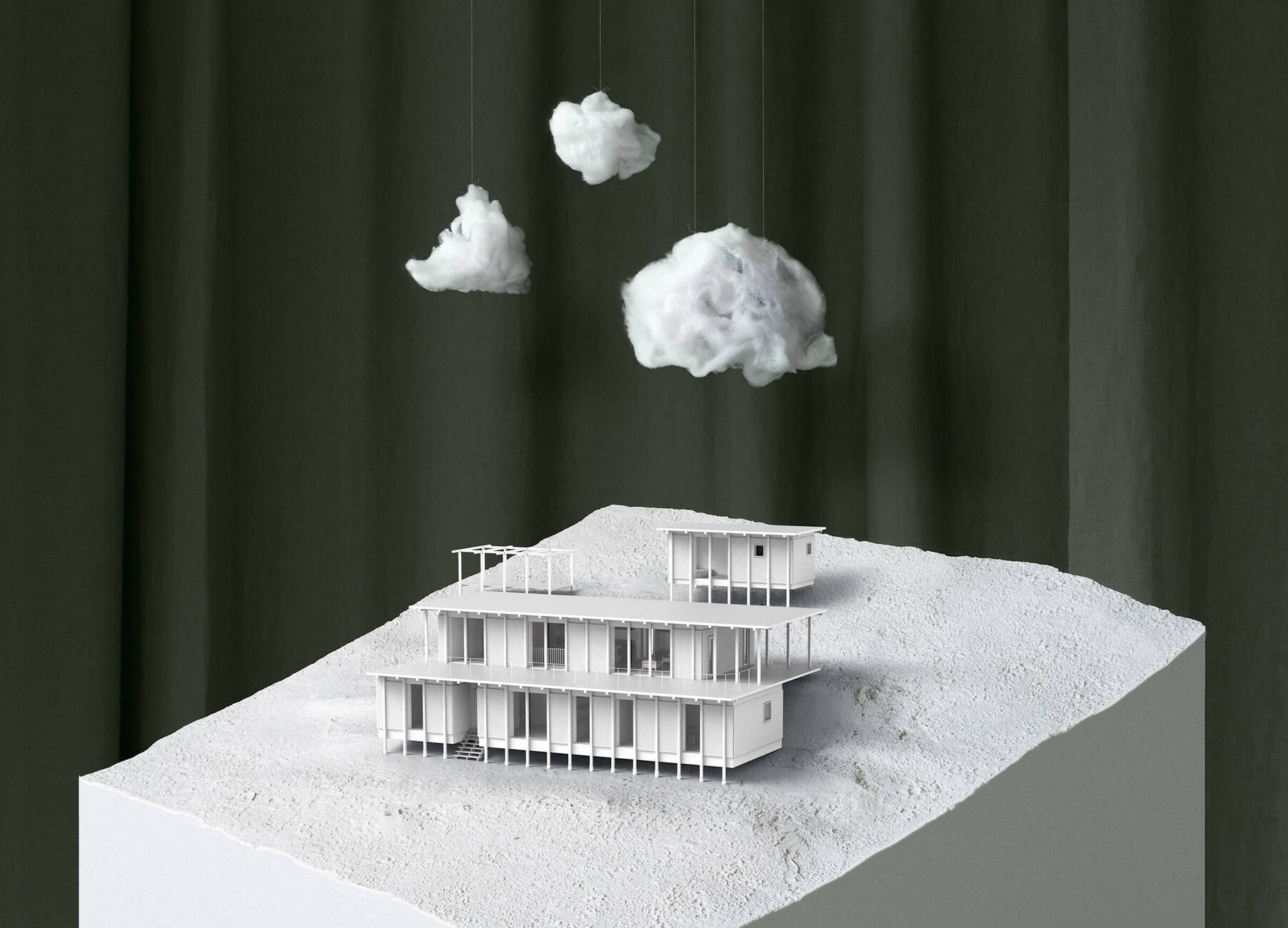 In order to make sure the building stood firm on the soft terrain, the stories were staggered like bungalows.