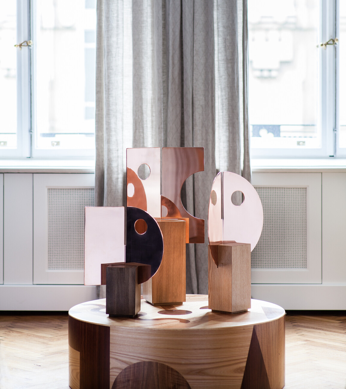 Maria Jeglinksa’s designs for “Autor Rooms” include a tripartite set of mirrors.